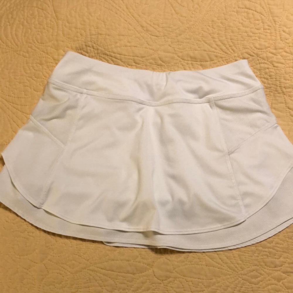 Athleta ladies white size XS, layered skort for tennis pickleball or golf.
